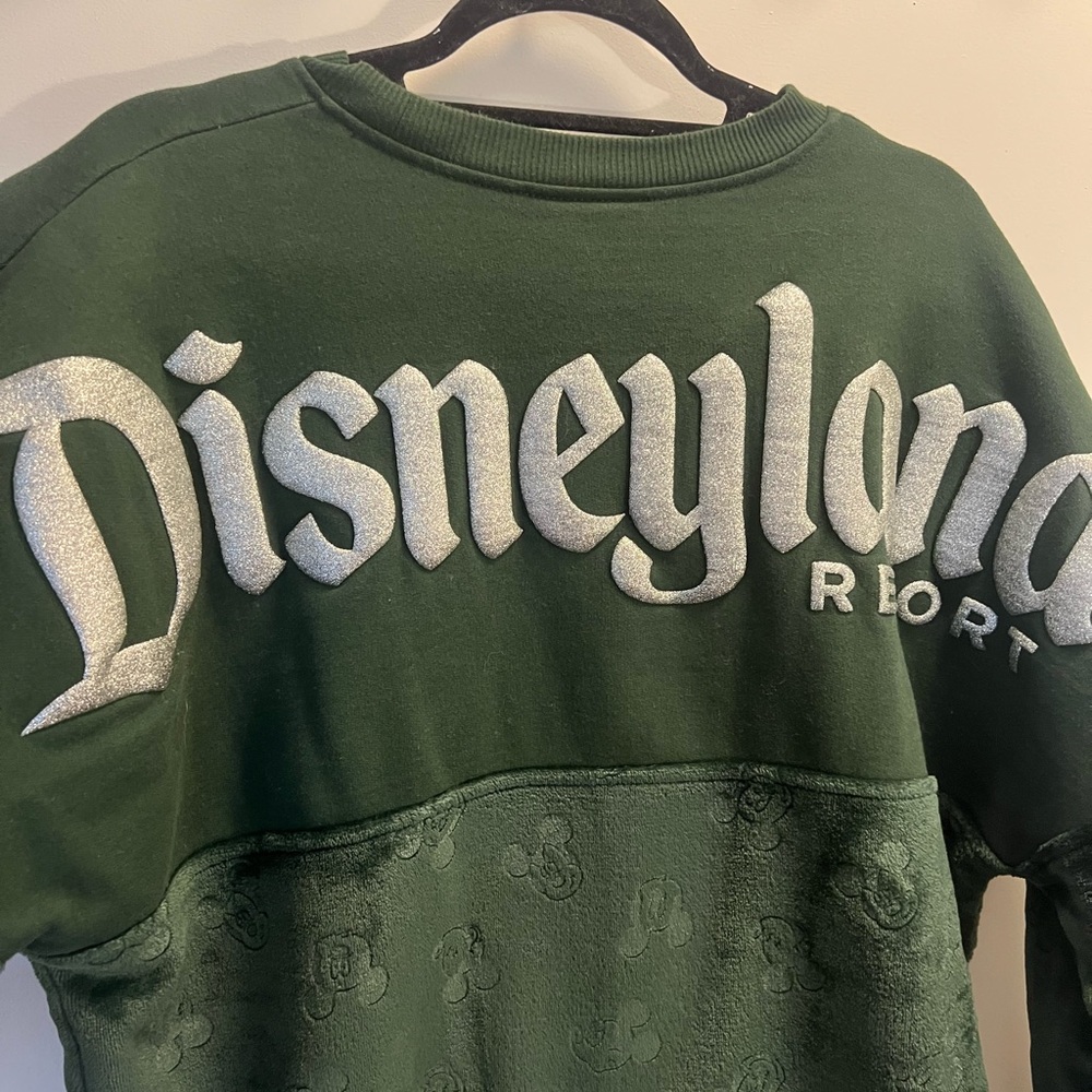 Disney Green Disneyland Resort Pullover Sweatshirt with Silver Logo